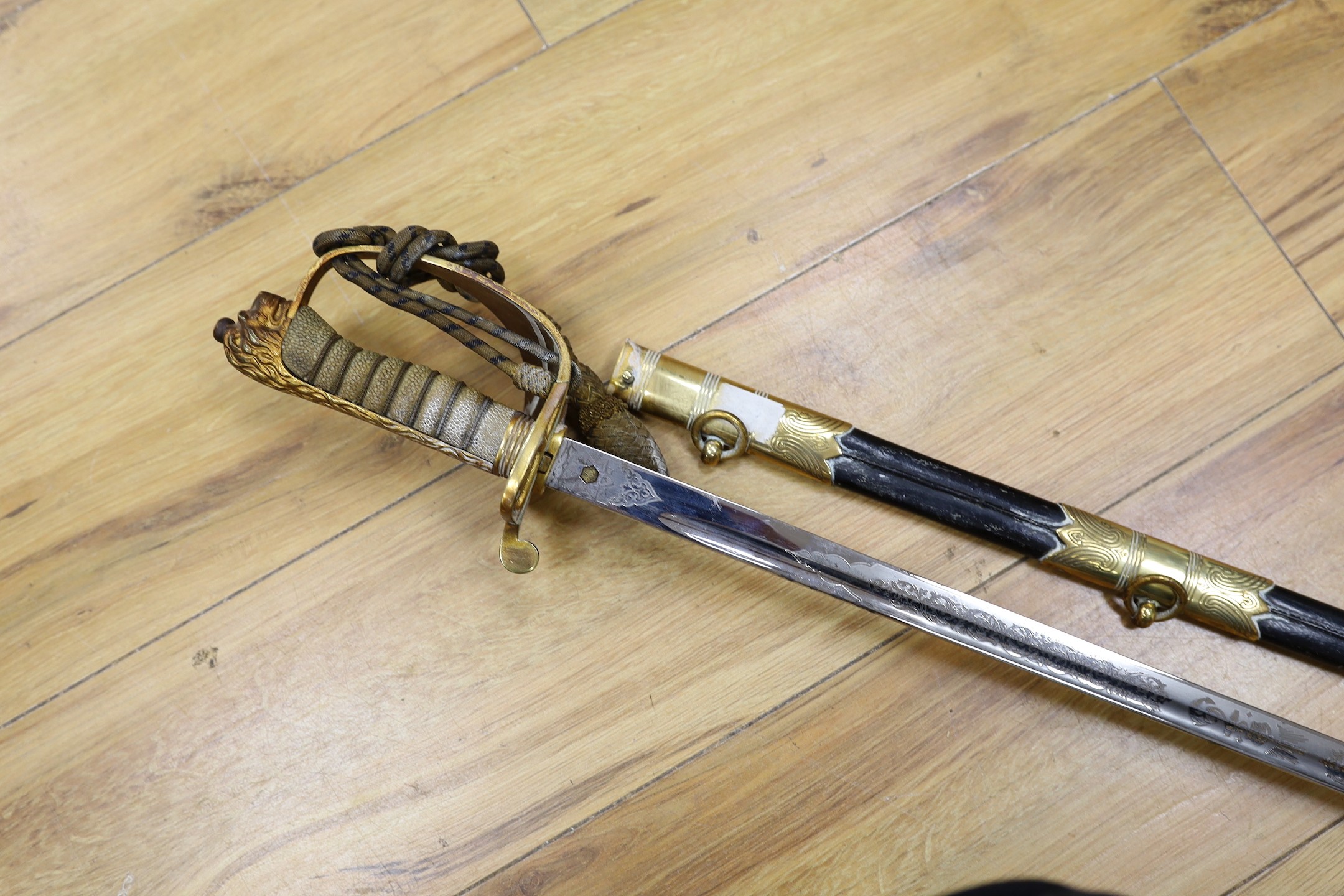 A QEII Naval officer's dress sword and scabbard